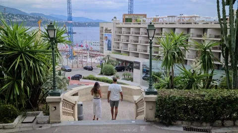 8K Couple Walking Down Stairs Stock Footage 139002012