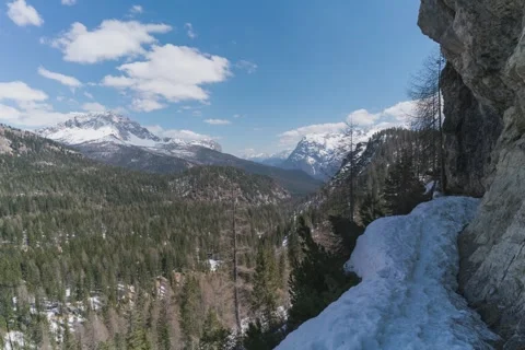 8K Dolomites spring landscape with last snow Stock Footage 256178099