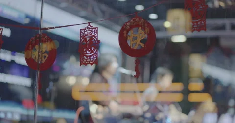 8K Festive paper-cuts on the windows of Beijing night bars Stock Footage 149870530