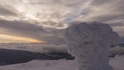 8K Frozen landscape and tree, sunset colours, low clouds Stock Footage 108126953