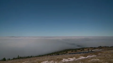 8K Full moon midnight clouds rolling over the hill Stock Footage 255612747