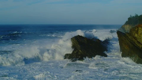 8K Giant waves crashing in 60p slow motion at Shore Acres State park in North Stock Footage
