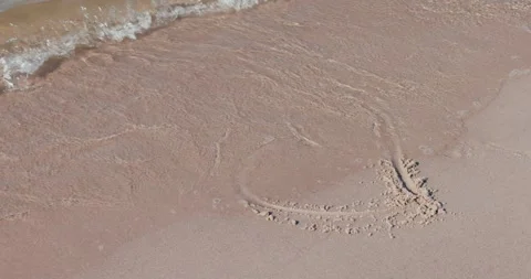 8K heart on the beach Video stock 242501120