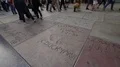 8K Hollywood Chinese Theater Time Lapse of tourists walking on Handprints 4k or 4k+ Resolution