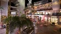 8K Hollywood Highland Time Lapse of tourists and shops in courtyard at night 4k or 4k+ Resolution