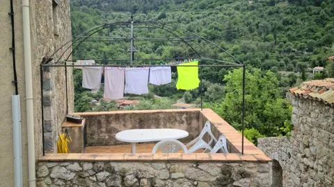 8K Laundry Drying On A Balcony Stock-Footage 131601135