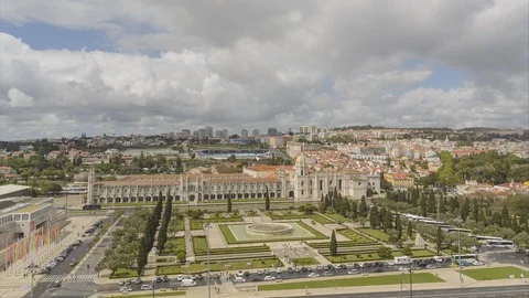 "8K Lisbon Time Lapse:  Praca do Imperio gardens and Monastery dos Jeronimos" Video stock 100852370