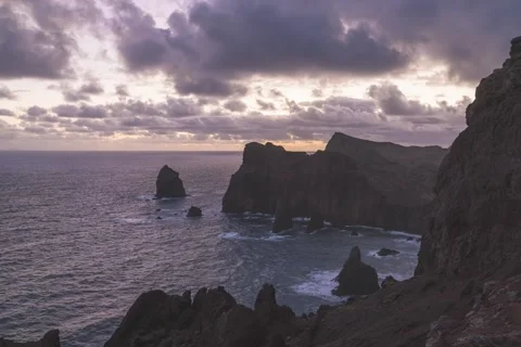 8K Madeira morning dramatic clouds over the rock and sea Stock Footage 241454281