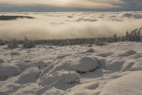 8K Massive low clouds rolling over the mountains Stock Footage 256037073
