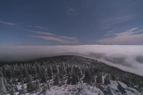 8K Midnight low clouds illuminated by fullmoon Stock Footage 256097026