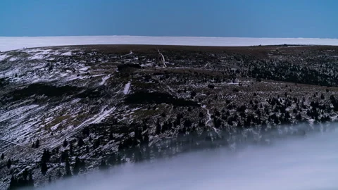 8K Midnight low clouds rolling in the valley and over the mountains Stock Footage 255741466