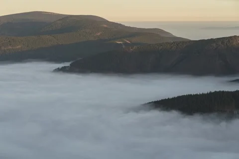 8K Morning low clouds rolling in the valley Stock Footage 256149178