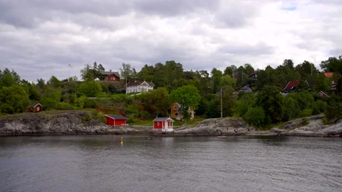 8k Norway tiny summer homes on the water Video stock 210973737