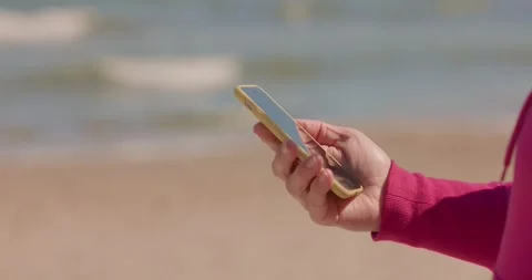 8K phone on the beach Video stock 240584272
