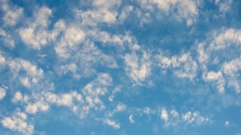 8K real time blue sky with light clouds passing Stock Footage 100755542