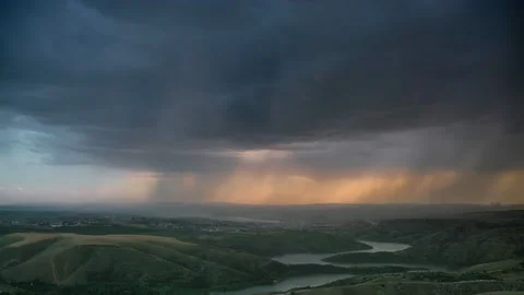 8K Storm Clouds and Rain at Sunset Stock Footage 169480043