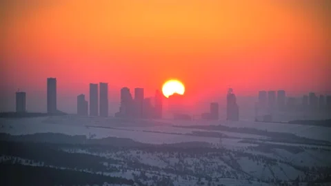 8K Sunrise Over High Skyscraper Constructions in City Stock Footage 170403104