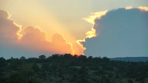 8K Sunset behind the clouds in the bush Stock Footage 171758890