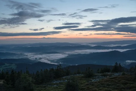 8K Sunset clouds with mists in the valley Video stock 126808446
