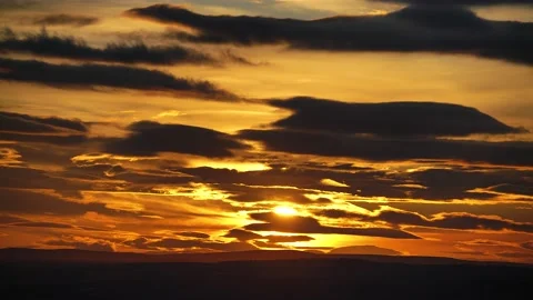 8K Sunset Through the Lined Layer Clouds Stock Footage 169093660