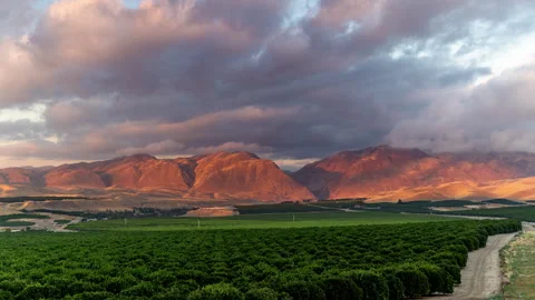 8K Sunset Time lapse of Kern River Canyon and green orchards Stock Footage 253856042