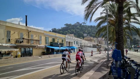 8K Three Men Riding Bikes Stock Footage 137960352