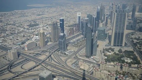 8K Time Lapse Aerial View of Dubai Skyline Towers Cars Traffic on Busy Highway 스톡 동영상 105654781