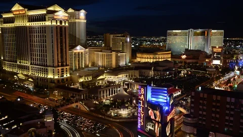 8K Time Lapse Aerial View of Las Vegas Skyline Sights Cars Traffic Dusk to Night Video stock 105656278