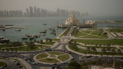 8K Time Lapse Aerial View of Doha Skyline Cars Traffic on Corniche Roundabout Stock-Footage 106608662