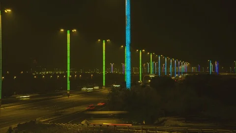 8K Time Lapse of highway in doha, Qatar, night, with rainbow lights, tilt shot Stock Footage 108444137