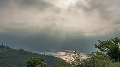 8K Time-lapse of natural scenery with crepuscular rays in Qutang Gorge Stock Footage 339990296