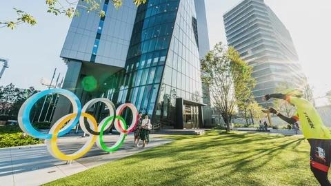 8K time-lapse of people visit Olympic symbol logo at Japan Olympic Museum Stock Footage 120872805