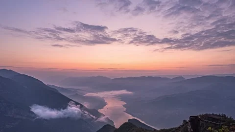 8K Time-lapse of rosy dawn and mist over stunning Three Gorges Stock Footage 339990376