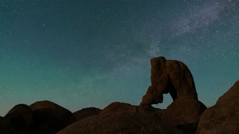 8K Time lapse of starry sky over Lady Boot Arch in Alabama Hills, California Stock Footage 140375424