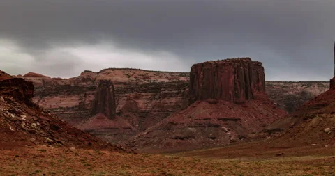 8k - Timelapse of afternoon clouds moving over a red rock canyon 스톡 동영상 157766467