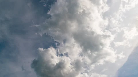 8K Timelapse backdrop of clouds developing against blue sky Stock Footage 317582435