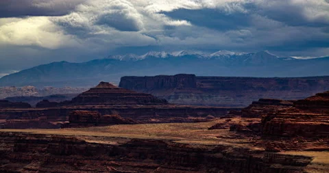 8k - Timelapse of fast moving clouds over a desert landscape Stock Footage 157766309
