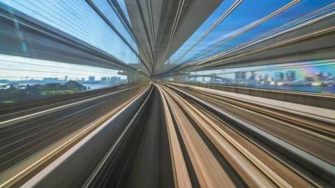 8K Timelapse Motion blur of moving train at sunset, Tokyo, Japan Stock Footage 121659657