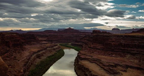 8k - TImelapse over a desert river canyon Stock Footage 157765933