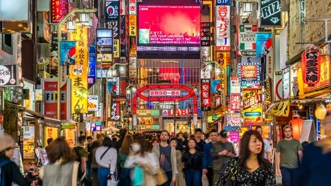 8K UHD Time lapse of crown or tourist walking on street at Kabuki-cho, Shinjuku Video stock 120735609