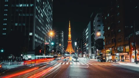 8K UHD time-lapse of illuminated Tokyo tower, car traffic transport at night Stock Footage 120252084