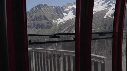 8K video inside red cable car in Mer de glace in chamonix-mont-blanc valley Stock Footage 222023042