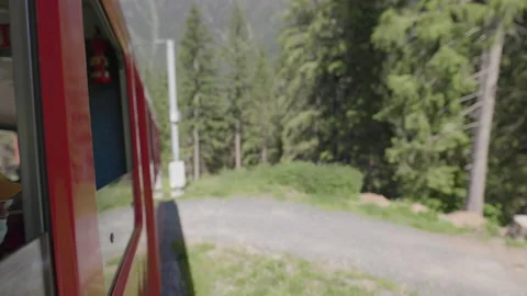 8K video red rack train montenvers train going up in chamonix-mont-blanc valley Stock Footage 222012835