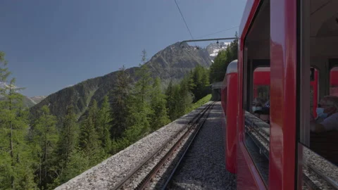 8K video red rack train montenvers train in chamonix-mont-blanc valley Stock Footage 222013397