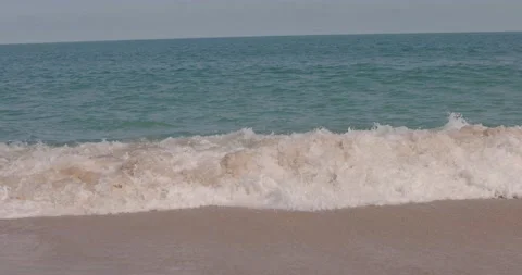 [8K] Waves Crashing on a Beach Stock Footage 211077256