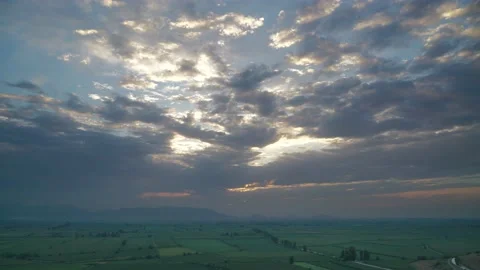 8K Wide Flat Plain Covered With Green Fields Stock Footage 171727946