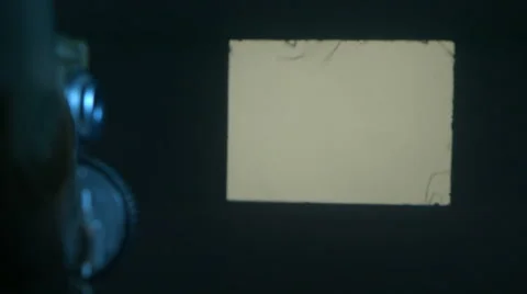 8mm projector with copy space on the wall Stock Footage 64098724