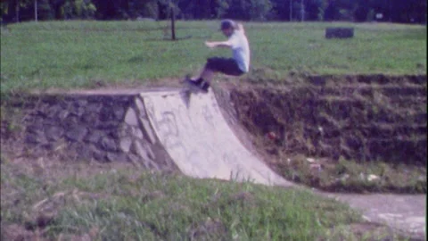 8mm skateboarder doing a frontside smith grind, Durban South Africa. Stock-Footage 146765492