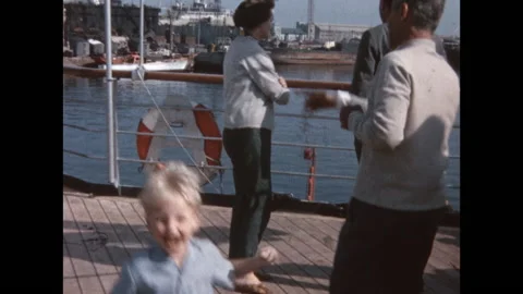 8MM - SPAIN - young boy having fun on the ship deck - Barcelona - 1964 Stock Footage 167789431