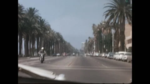 8MM - USA - car driving in ocean Avenue - Santa Monica - 1970 Stock Footage